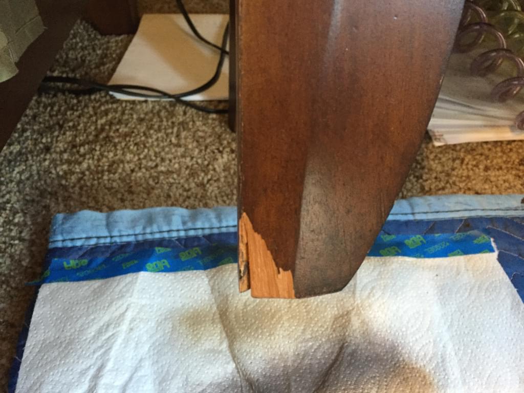 chipped table leg